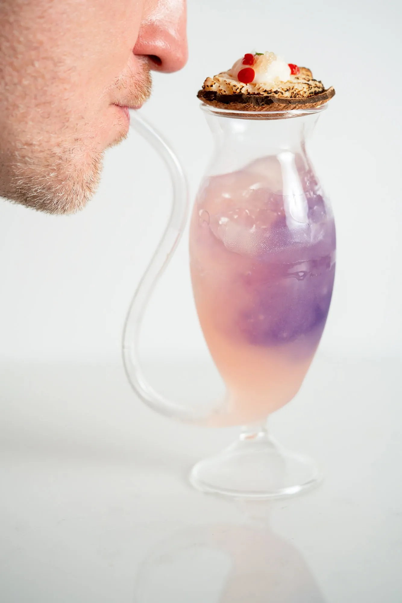 The action shot: pink layer bubbling up as the blue layer plunges down